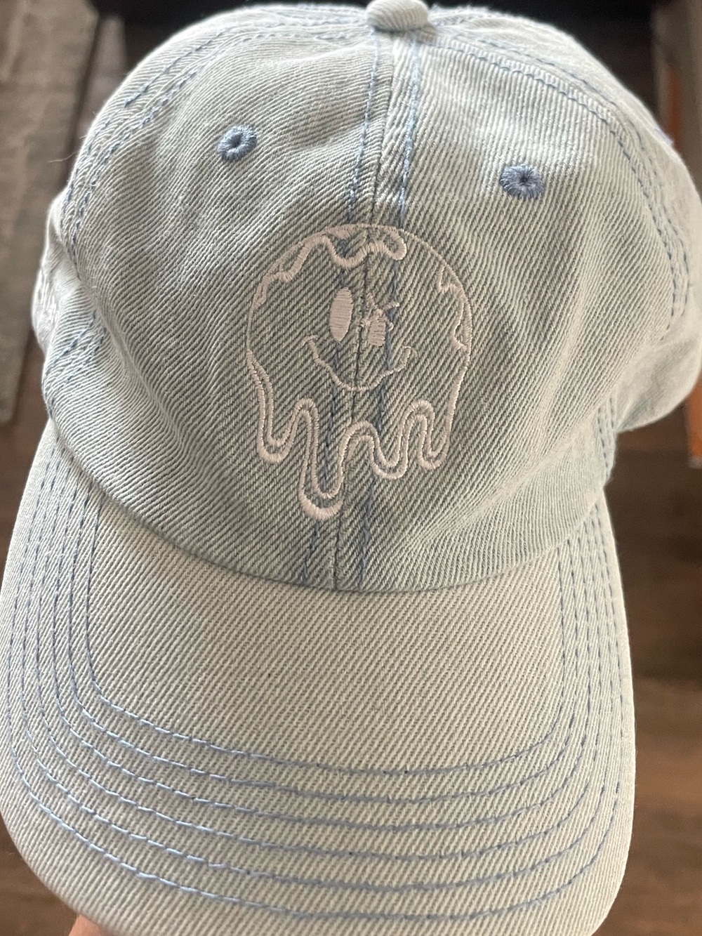 Dutch Bros Light Blue Drip Smiley Baseball Cap